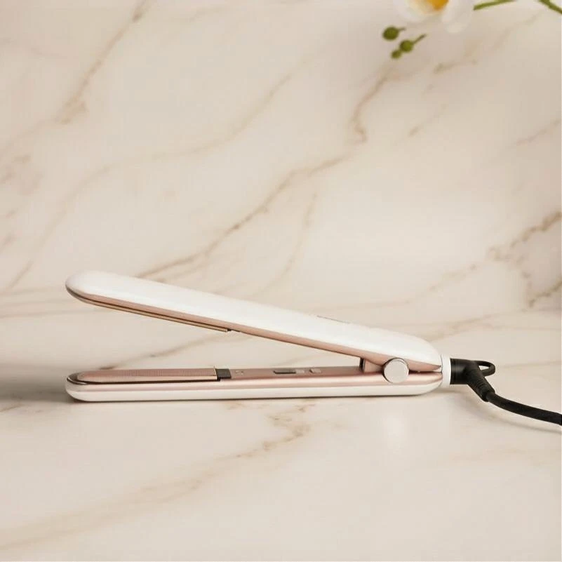 مكواة فرد الشعر