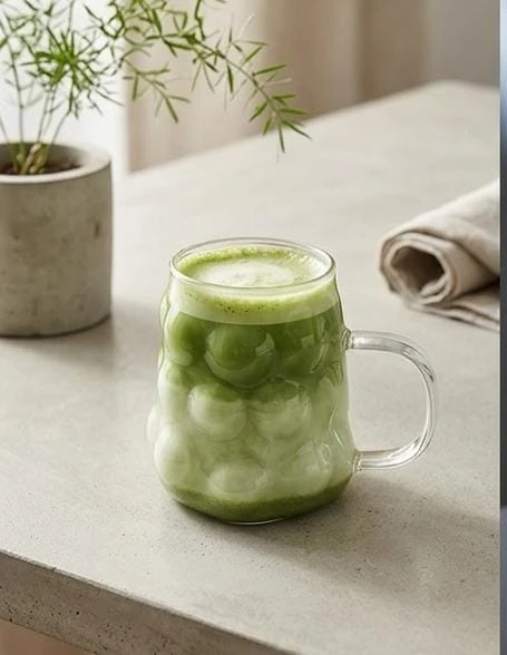 كوب زجاجي بتصميم القنبلة اليدوية