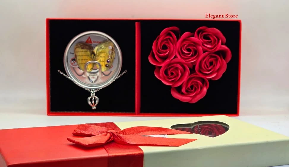 قـلادة الـمـحـارة مـع بـكـج ورود مـمـيـز